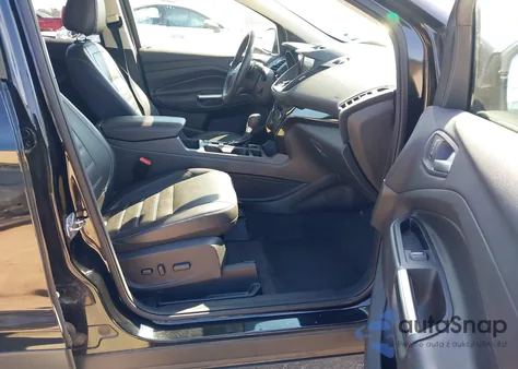 2017 Ford Escape Titanium z USA, uszkodzony, nr VIN 1FMCU0J96HUA64820